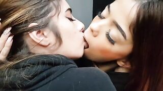 Beautiful young Brazilian babes in passionate deep kissing